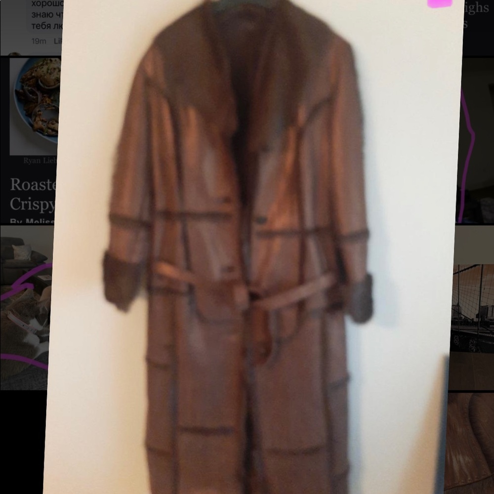 Genuine suede and fur long coat. New without tags. fur on the color and sleeves.